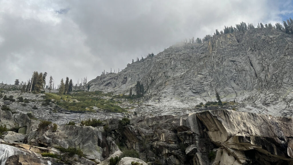 The clouds rolling over the mountain top as seen from the end of Tokopah Falls Trail in Sequoia National Park