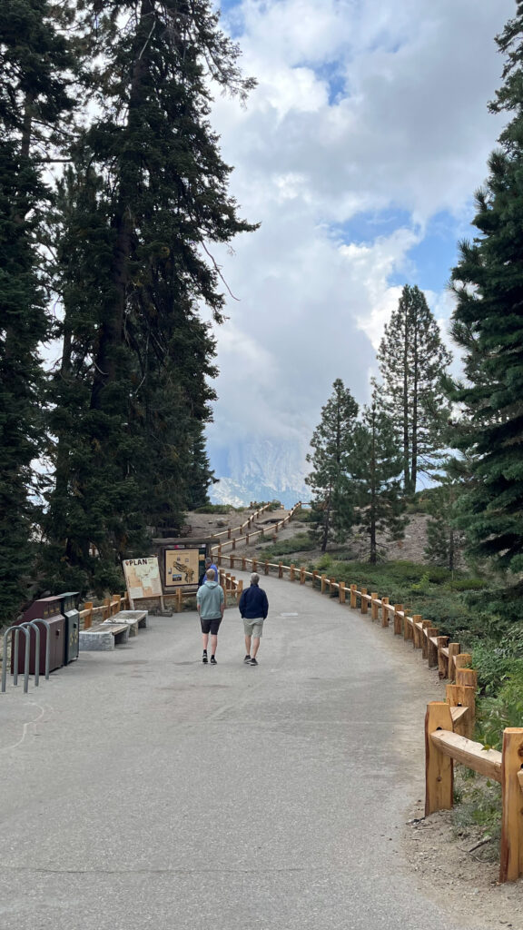 The paved trail leading from the parking lot to Glacier Point overlook in Yosemite National Park