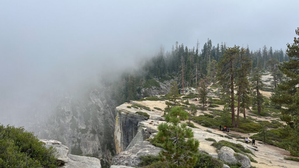 Clouds starting to rush up from the valley below at Taft Point, Yosemite National Park