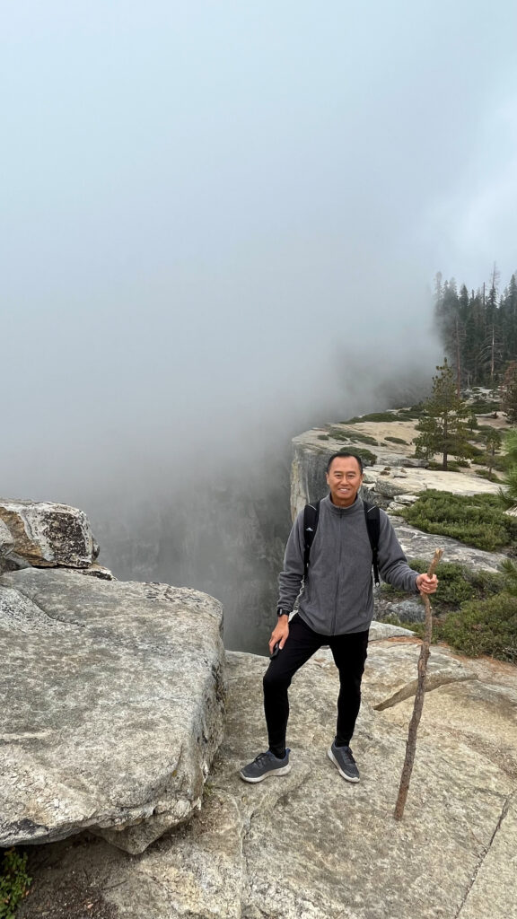 Clouds rushing up from the valley below at Taft Point, Yosemite National Park