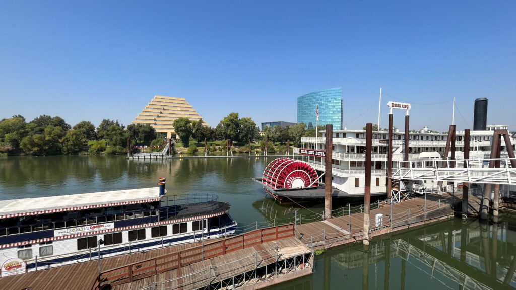 Delta King (an authentic paddlewheel riverboat) and other sites along the Sacramento River on the boardwalk at Old Sacramento Waterfront, Sacramento, CA