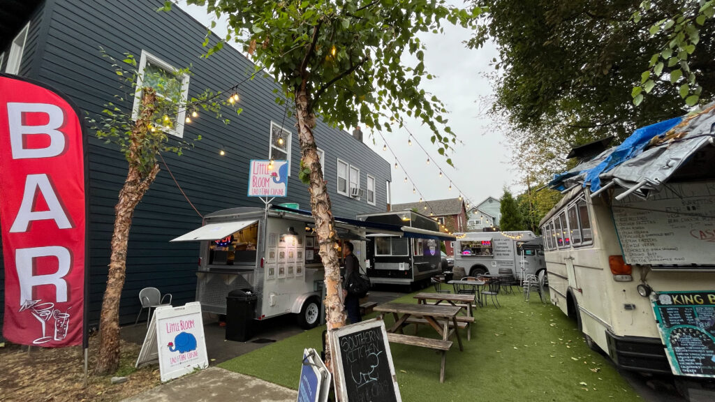 The small food cart area where Little Bloom Lao and Thai Cuisine is located on N Mississippi Ave in Portland, OR