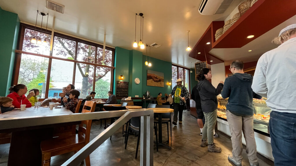 Ken's Artisan Bakery in Portland, OR had a long, slow moving line and not great food served with barely warm hot chocolate