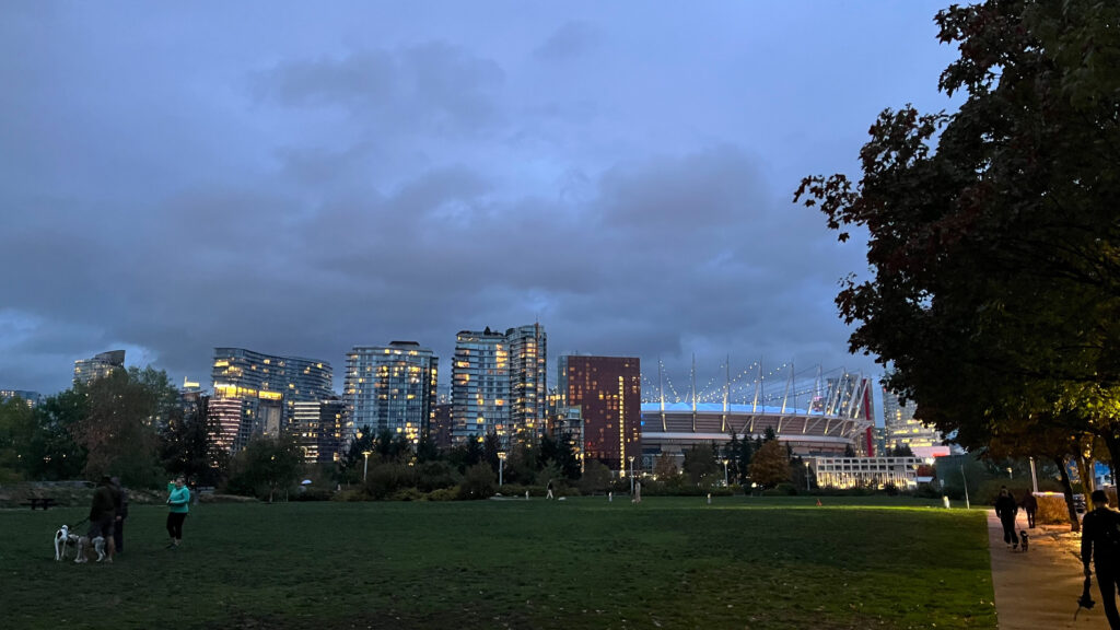 BC Place Stadium and a few buildings in the distance as seen from Hinge Park (in Vancouver, BC, Canada)