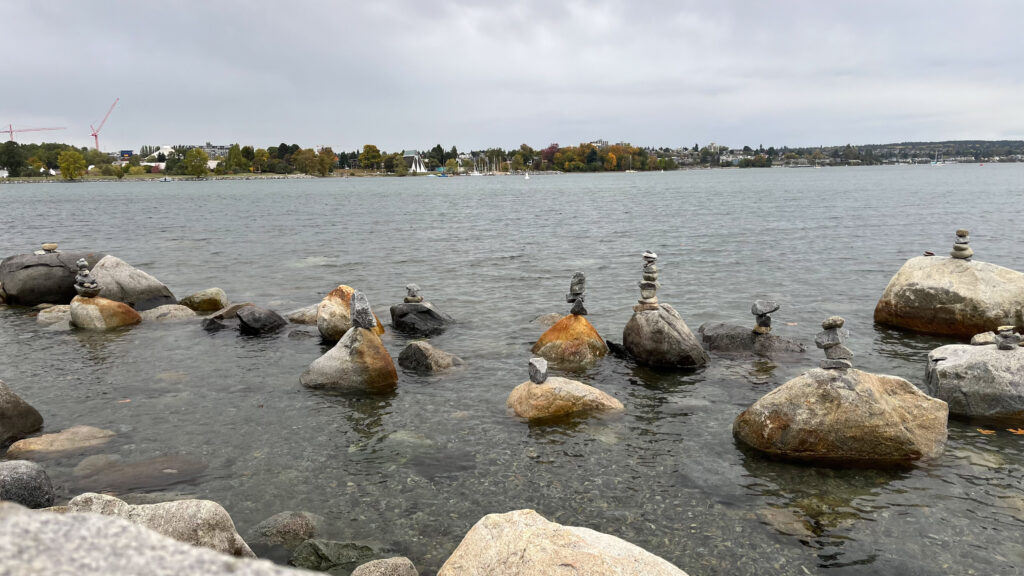 Stacked rocks in the water near English Bay Beach as seen during our walk on the Vancouver Seawall from English Bay Beach to Granville Street  (Vancouver, BC, Canada)