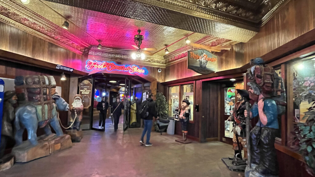 This photo is not that great but it shows part of the inside of Miner's Landing at Pier 57. In the background is an area that leads to the arcade that has a carousel inside of it (on the Seattle Waterfront in Seattle, WA)