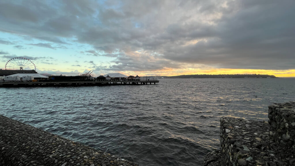 View from Alaskan Way between Piers 66 and 62 as the sun was about to set. The Seattle Great Wheel is on the left (Seattle Waterfront in Seattle, WA)