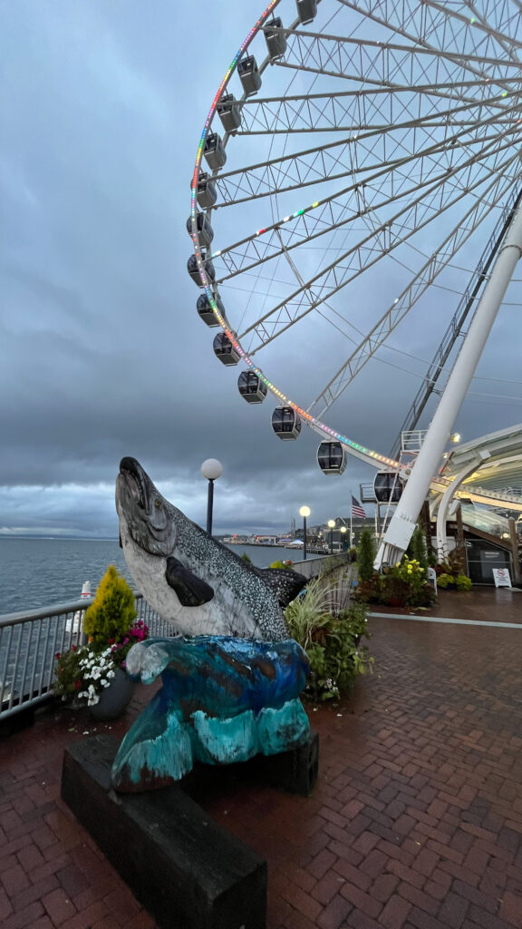 View from Pier 57 of The Seattle Great Wheel at the end of the pier (Seattle Waterfront in Seattle, WA)