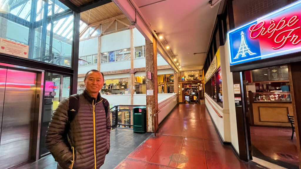 To the left of Crêpe de France is the staircase we walked down to get to Pike Brewing Company and Pike Pub (Pike Place Market in Seattle, WA)