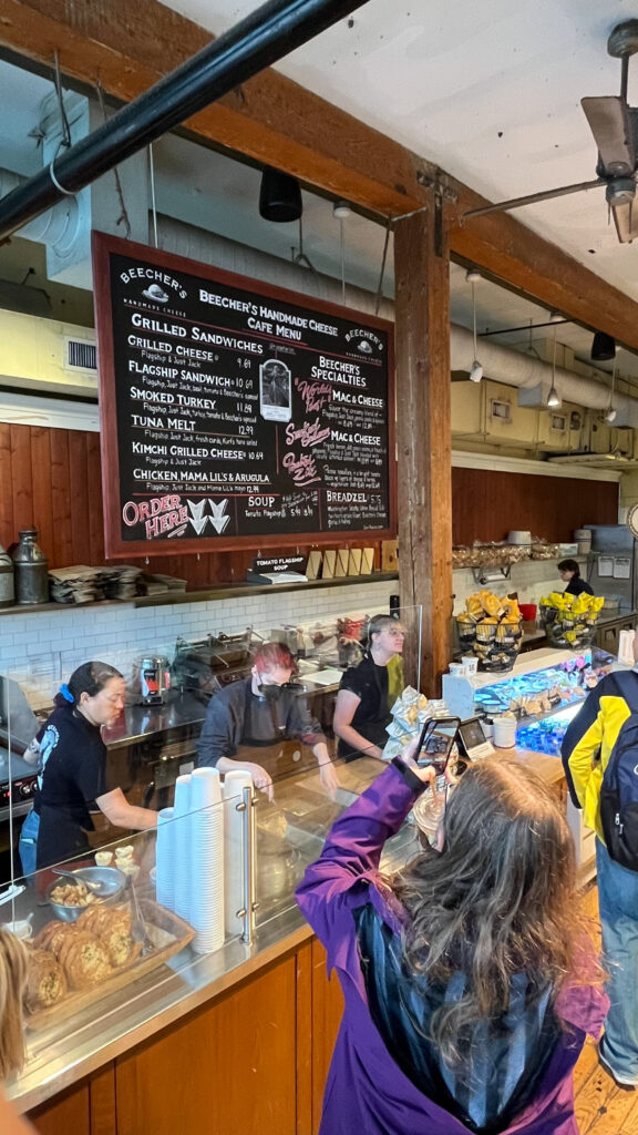 The busy order and pay counter at Beecher’s Handmade Cheese at Pike Place Market (Seattle, WA)