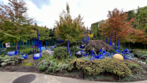 Blue glass artwork in the garden at Chihuly Garden and Glass. (Seattle, WA)