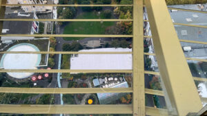 Looking down from the 520 feet open-air viewing area you can see part of Chihuly Garden and Glass (Space Needle, Seattle, WA)