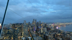 View of downtown Seattle, WA and Elliot Bay from the Space Needle as the sun was setting