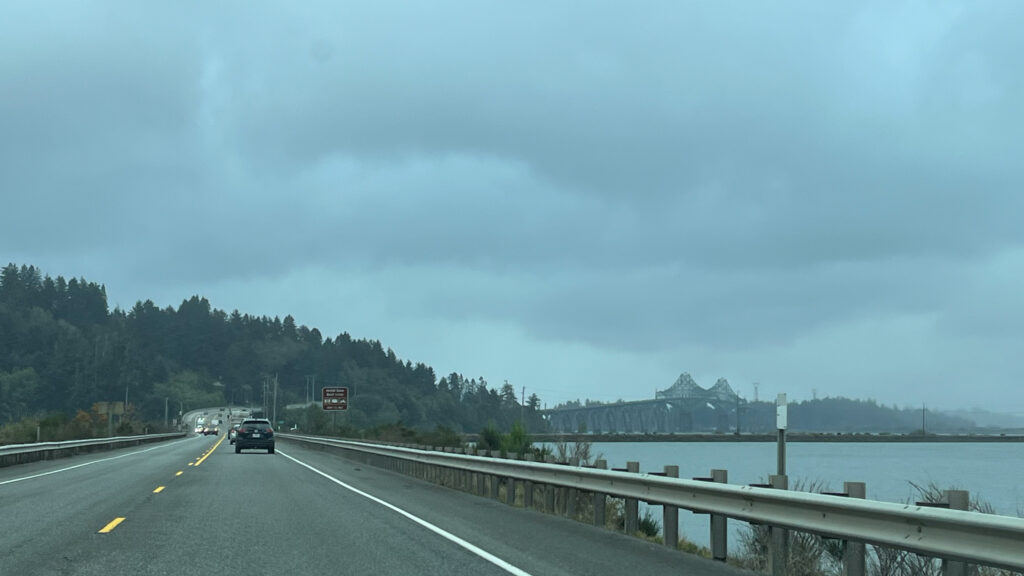 On U.S. 101 crossing Haynes Inlet Bridge with the Conde B. McCullough Memorial Bridge over Coos Bay ahead (I don’t like crossing large bridges over water)