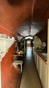 The kitchen and dining area of One-Log House in Garberville, CA - 17 miles south of the south entrance to Avenue of the Giants in the California Redwoods