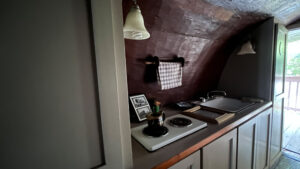 The kitchen of One-Log House in Garberville, CA - 17 miles south of the south entrance to Avenue of the Giants in the California Redwoods