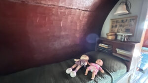 One of the two beds in the bedroom of One-Log House in Garberville, CA - 17 miles south of the south entrance to Avenue of the Giants in the California Redwoods