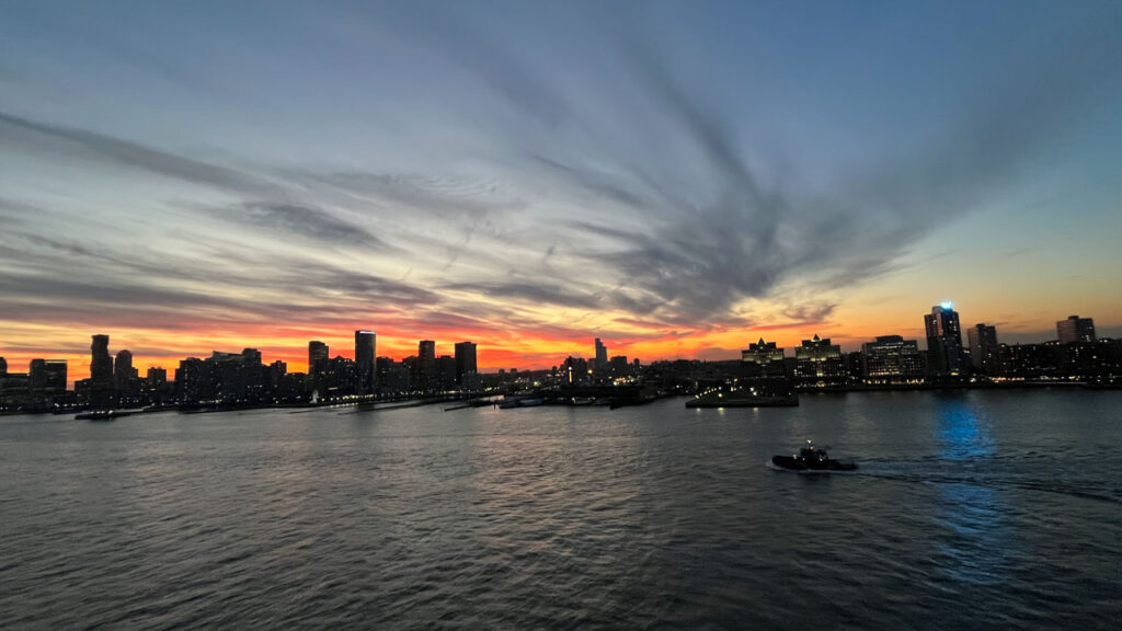 Sailing out of Manhattan, New York City, NY on the Carnival Venezia during sunset