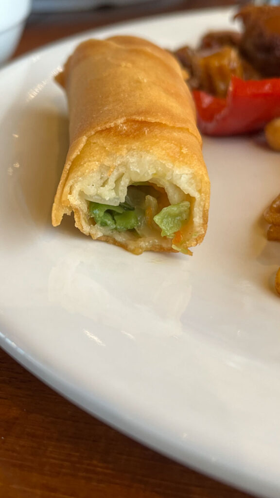 The inside of the yummy, crunchy Vegetable Spring Roll from the included (free) Chinese food lunch buffet at the Seafood Shack on the Carnival Venezia