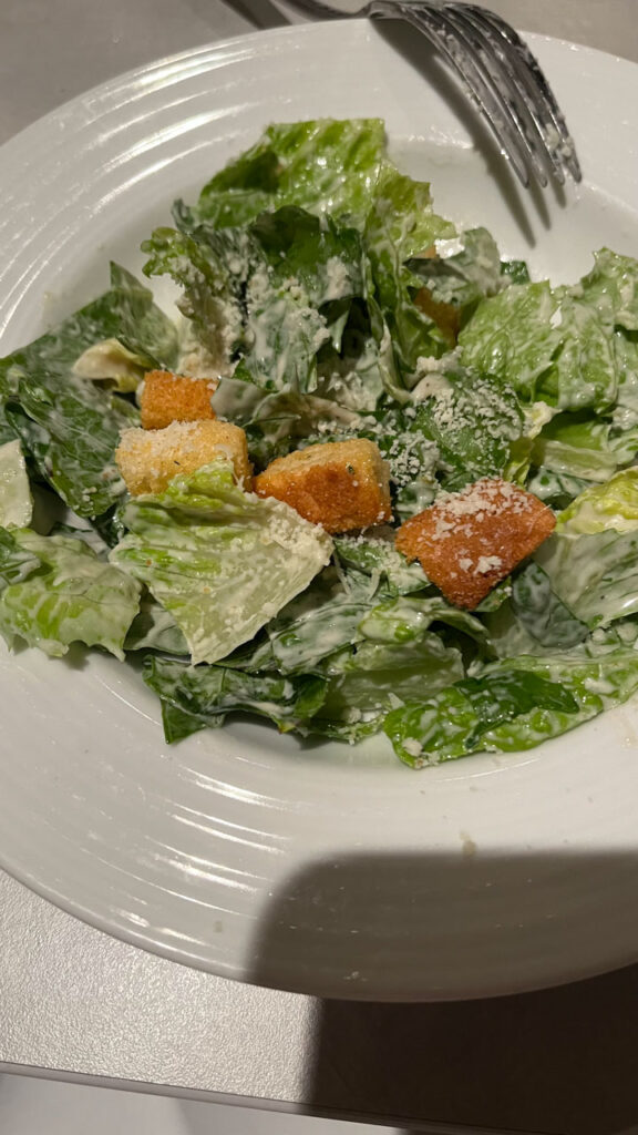 Caesar Salad in the Main Dining room at dinner time on the Carnival Venezia