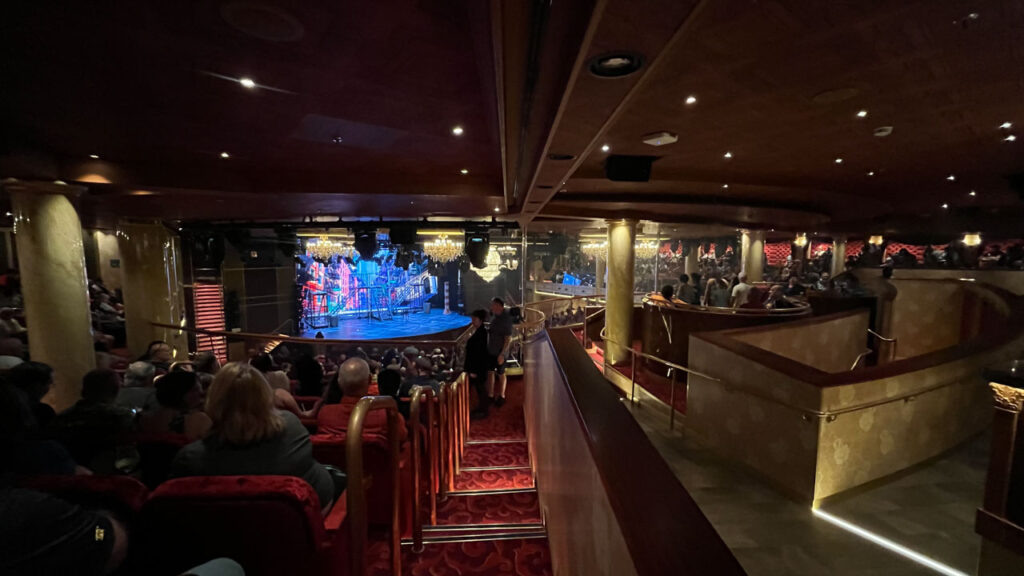 Your view is not obstructed by any columns if you stand up in the walkway at Teatro Rosso (the Main Theater) on the Carnival Venezia, but I would only do that from the back of the theater so as not to block anyone else's view