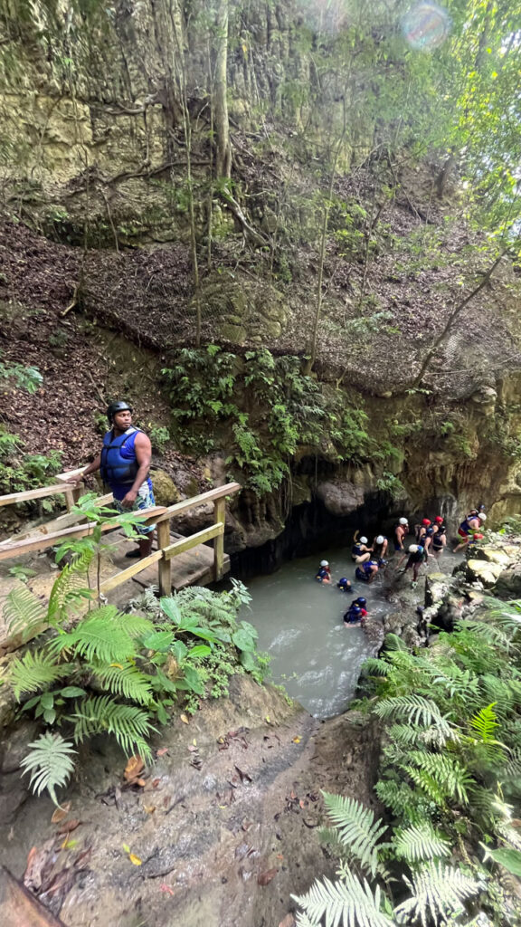 A slide and step climb down into another pool of water at Damajagua 27 Falls in the Dominican Republic