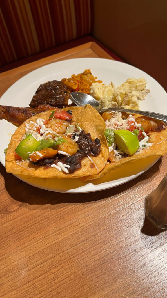 My husband's plate of lunch food from Chef's Choice Mexican food theme in the Lido Marketplace on the Carnival Venezia 