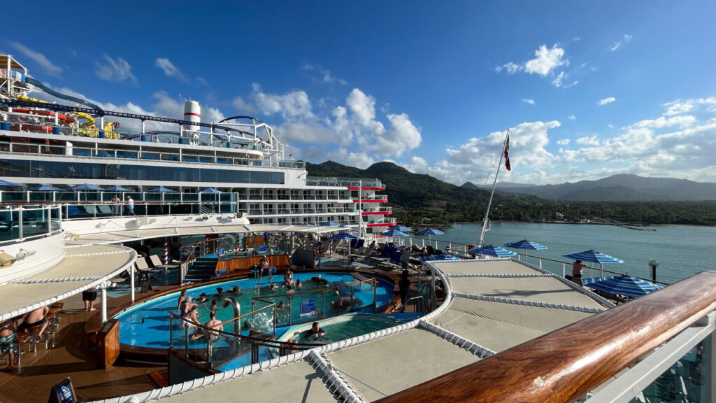 View of the Dominican Republic from the Carnival Venezia and the Burano Pool at the Lido Deck aft (part of some of the water slides are in the upper left of the picture)