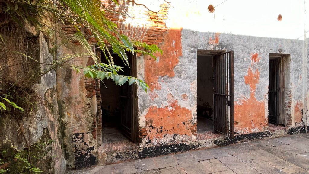 The prison cells that are accessible from a narrow passage from the back patio of the Puerto Rico Tourism Company on Paseo de la Princesa in San Juan, Puerto Rico that you can tour for free