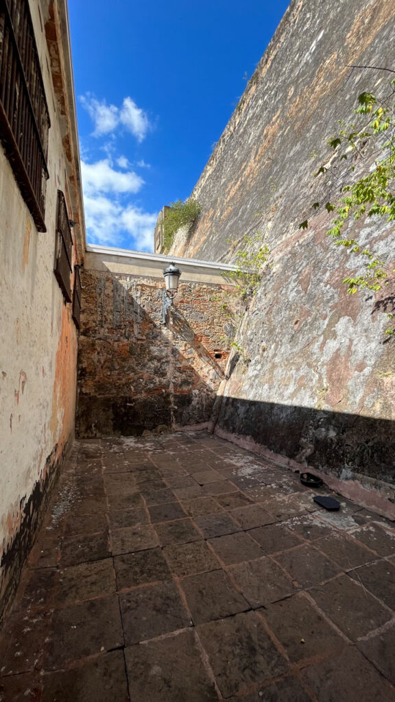 Behind the prison cells is a small patio area (behind the Puerto Rico Tourism Company on Paseo de la Princesa in San Juan, Puerto Rico)