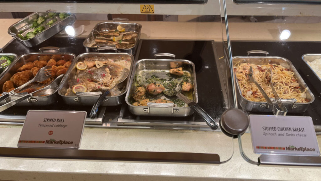 Some of the items available (including Striped Bass and Stuffed Chicken Breast) at the Lido Marketplace Dinner Buffet on the Carnival Venezia