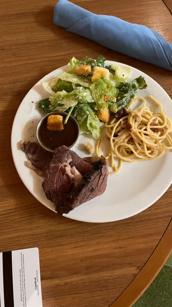 My husband's plate of food from the Lido Marketplace Dinner Buffet on the Carnival Venezia