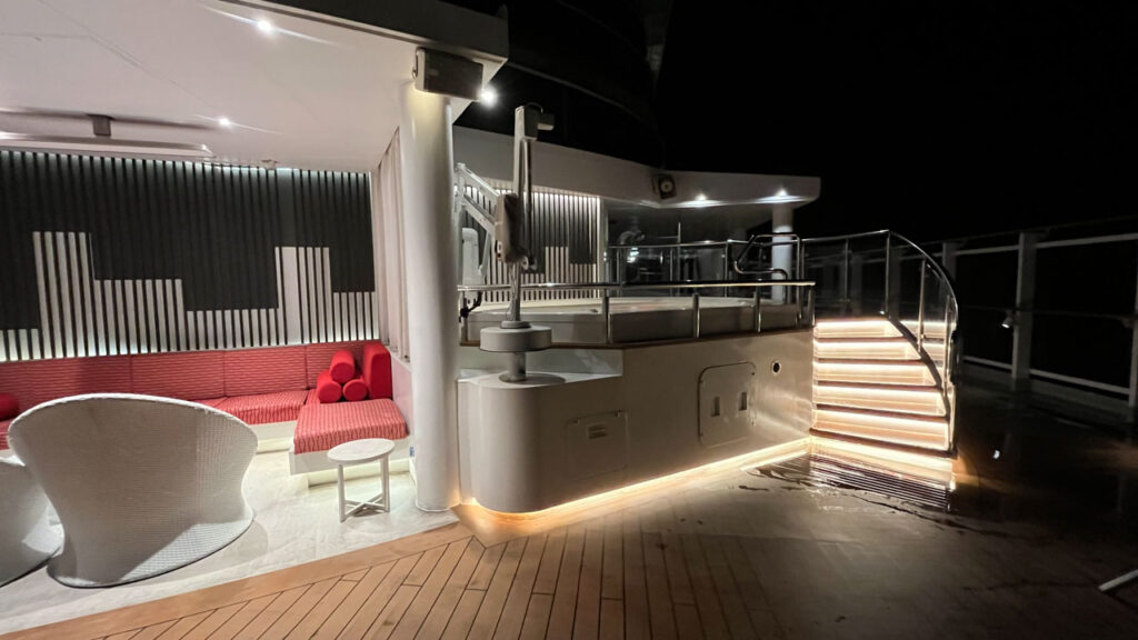 One of the two spas and a seating area on the Terrazza Carnevale outdoor deck area on the Carnival Venezia