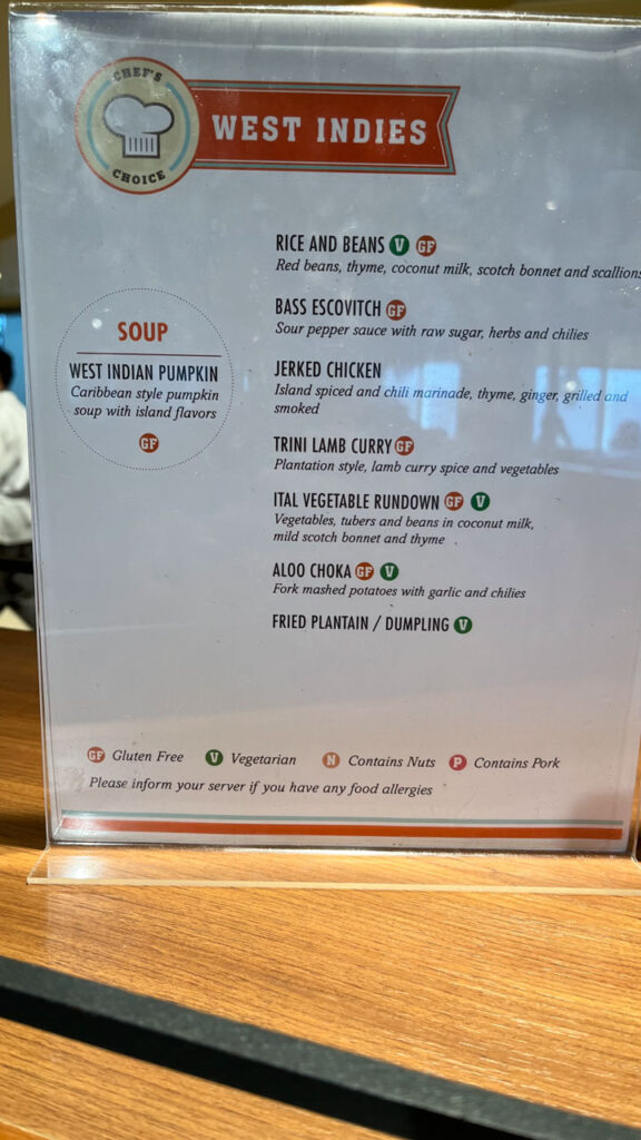 Menu showing some of the West Indies themed food items available at Chef's Choice at the Lido Marketplace lunch buffet on the Carnival Venezia