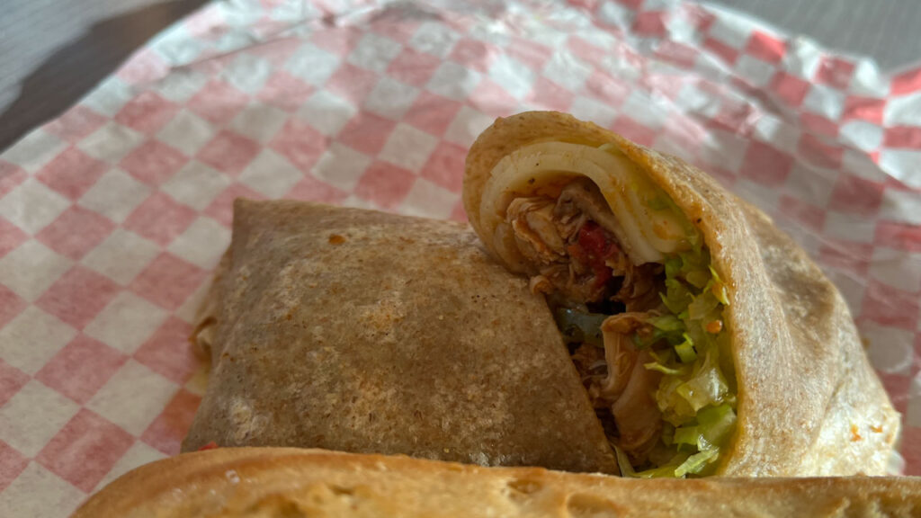 The Sicilian Chicken Wrap from Tomodoro on the Carnival Venezia (which is basically the Blue Iguana Cantina with three additional choices that are Italian themed). The Sicilian Chicken Wrap was better than I expected it would be.